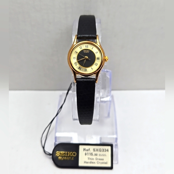 Seiko Quartz Women’s Gold Tone Bezel Black Leather Band Watch 1NO1-OE19 - Picture 1 of 12